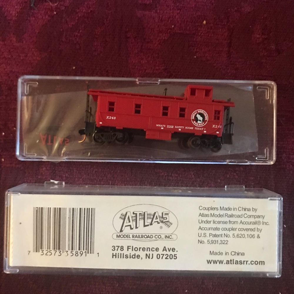 Atlas railway inc. Red caboose labeled Great northern railway.